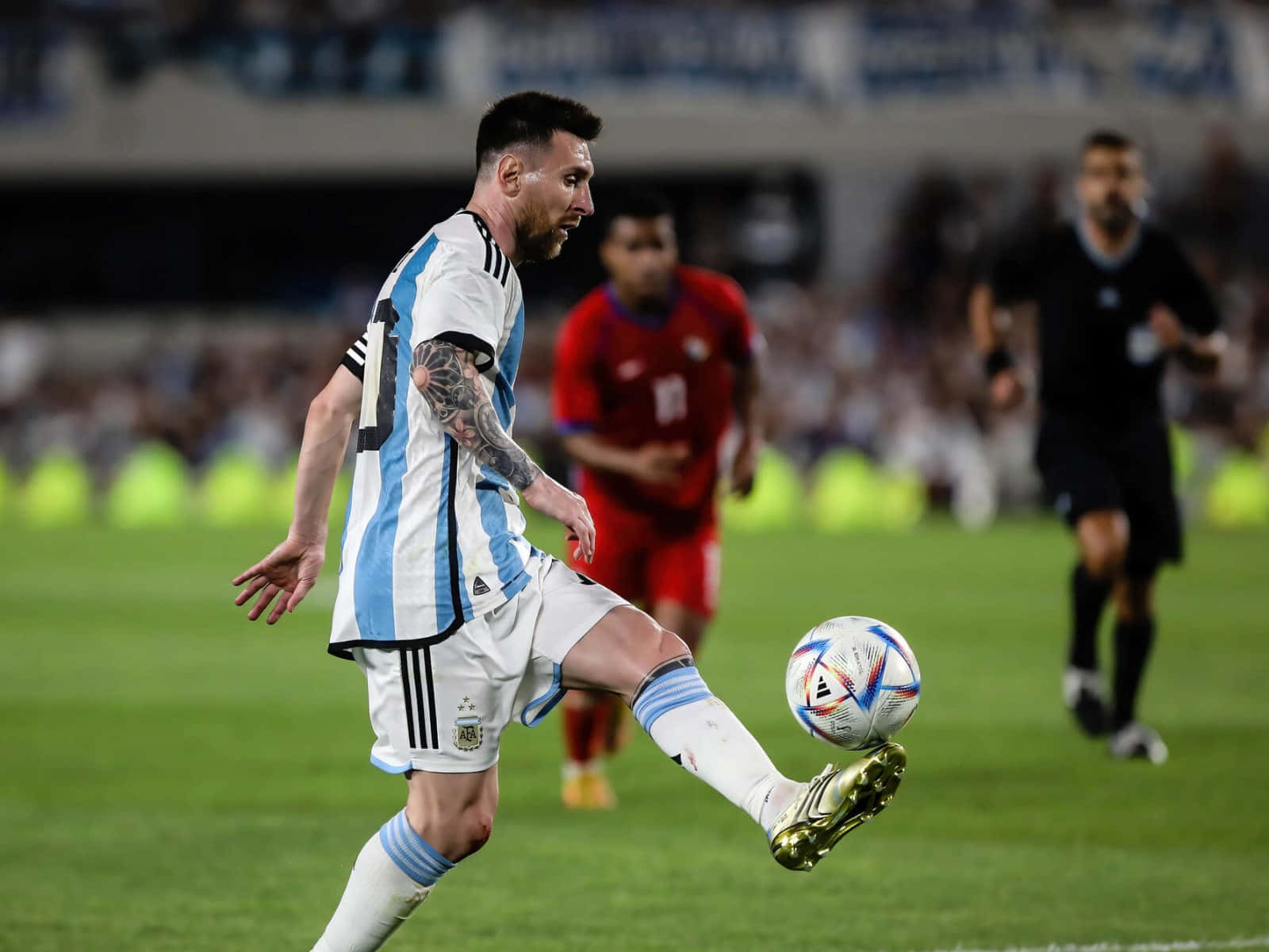 Messi In Action Dribbling Soccer Game Wallpaper