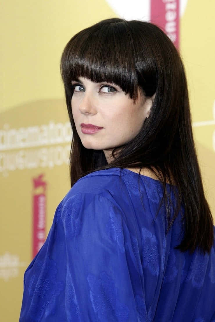 Mia Kirshner Blue Dress Event Wallpaper