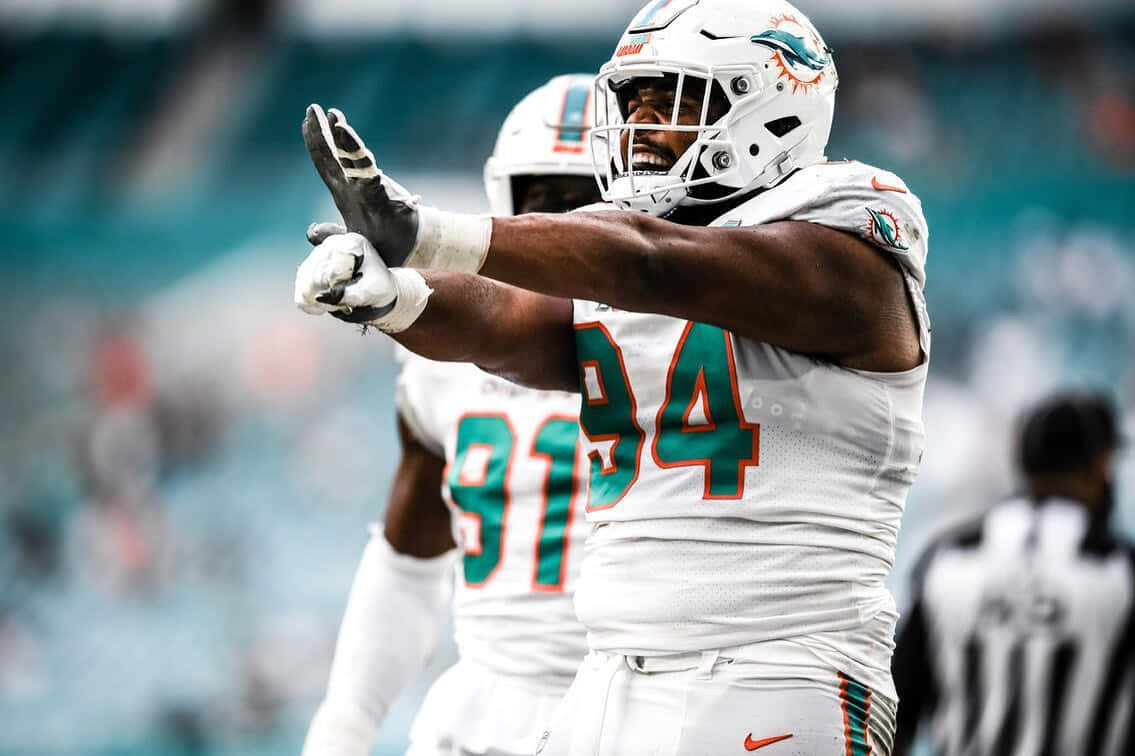 Miami Dolphins Defensive Lineman Celebration Wallpaper