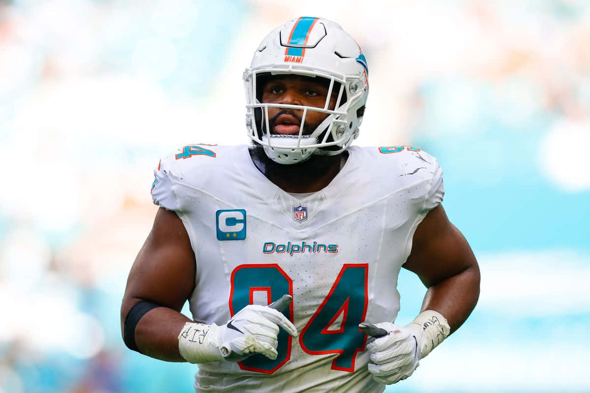 Miami Dolphins Defensive Lineman Christian Wilkins Action Shot Wallpaper