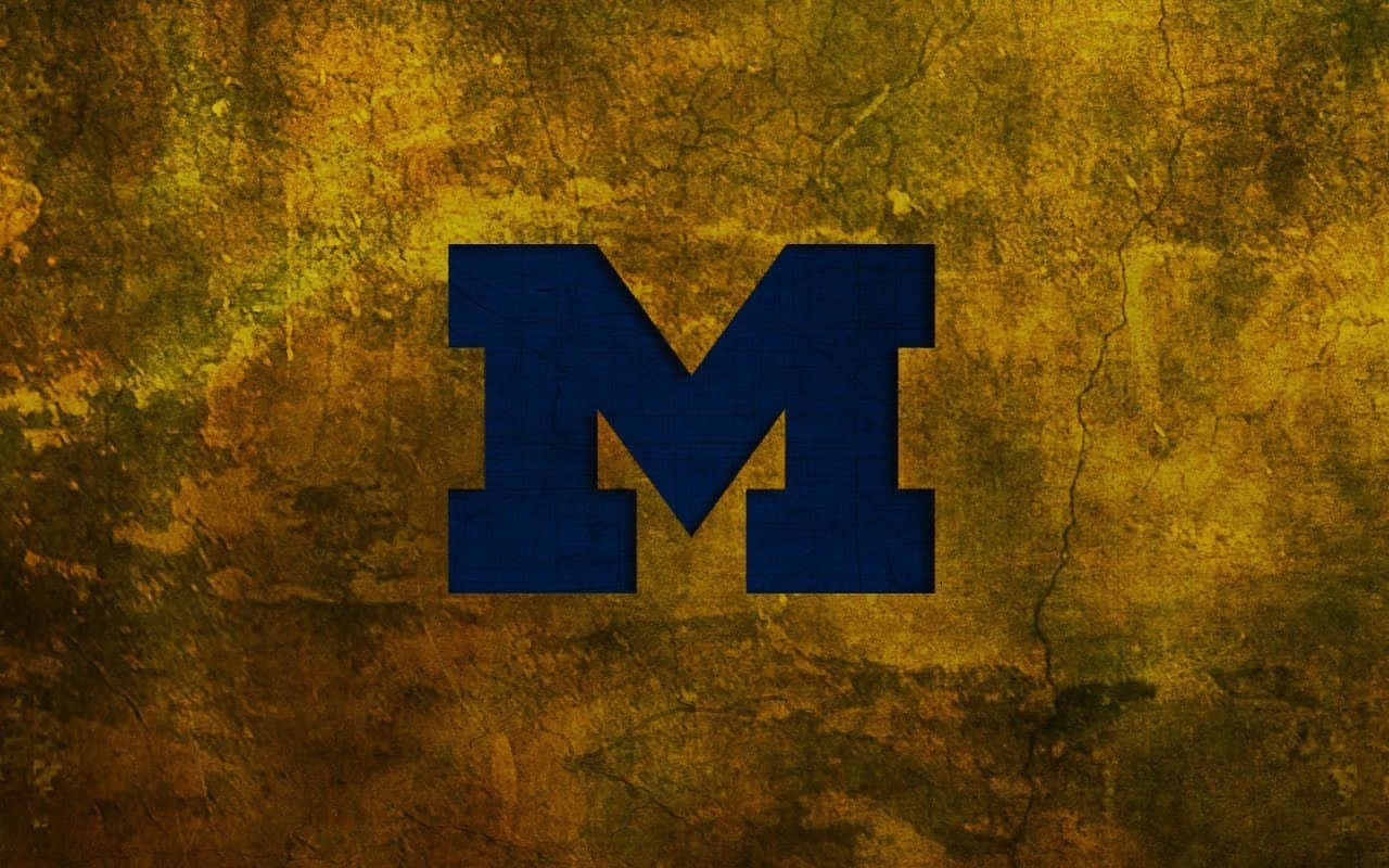 Michigan Wolverines Football Team On The Field Wallpaper