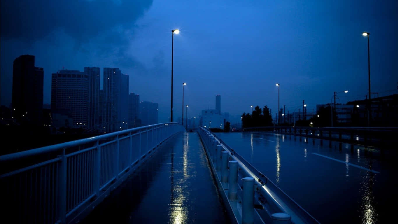 Midnight Blue Cityscape Rainy Pedestrian Path Wallpaper