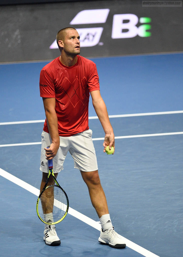 Mikhail Youzhny In Action With A Powerful Serve Wallpaper