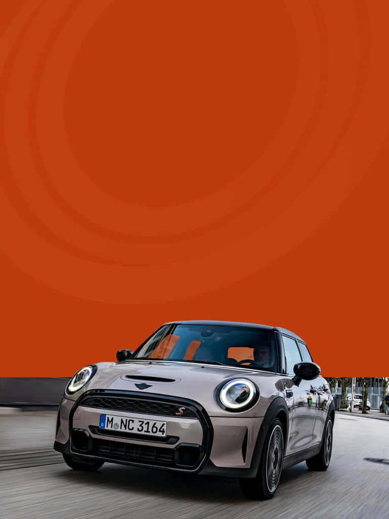 Mini Cooper S E Dynamic Drive Orange Background Wallpaper