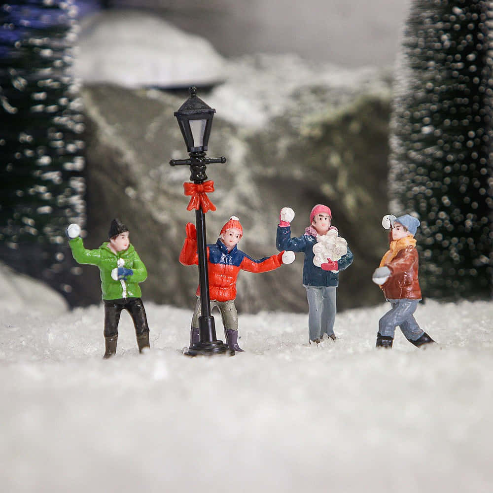 Miniature Snowball Fight Scene Wallpaper