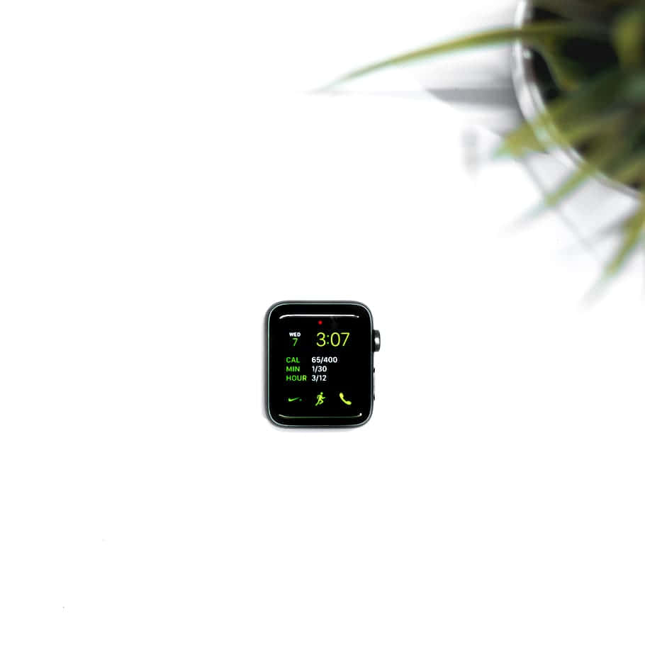 Minimalist Smartwatchon White Background Wallpaper