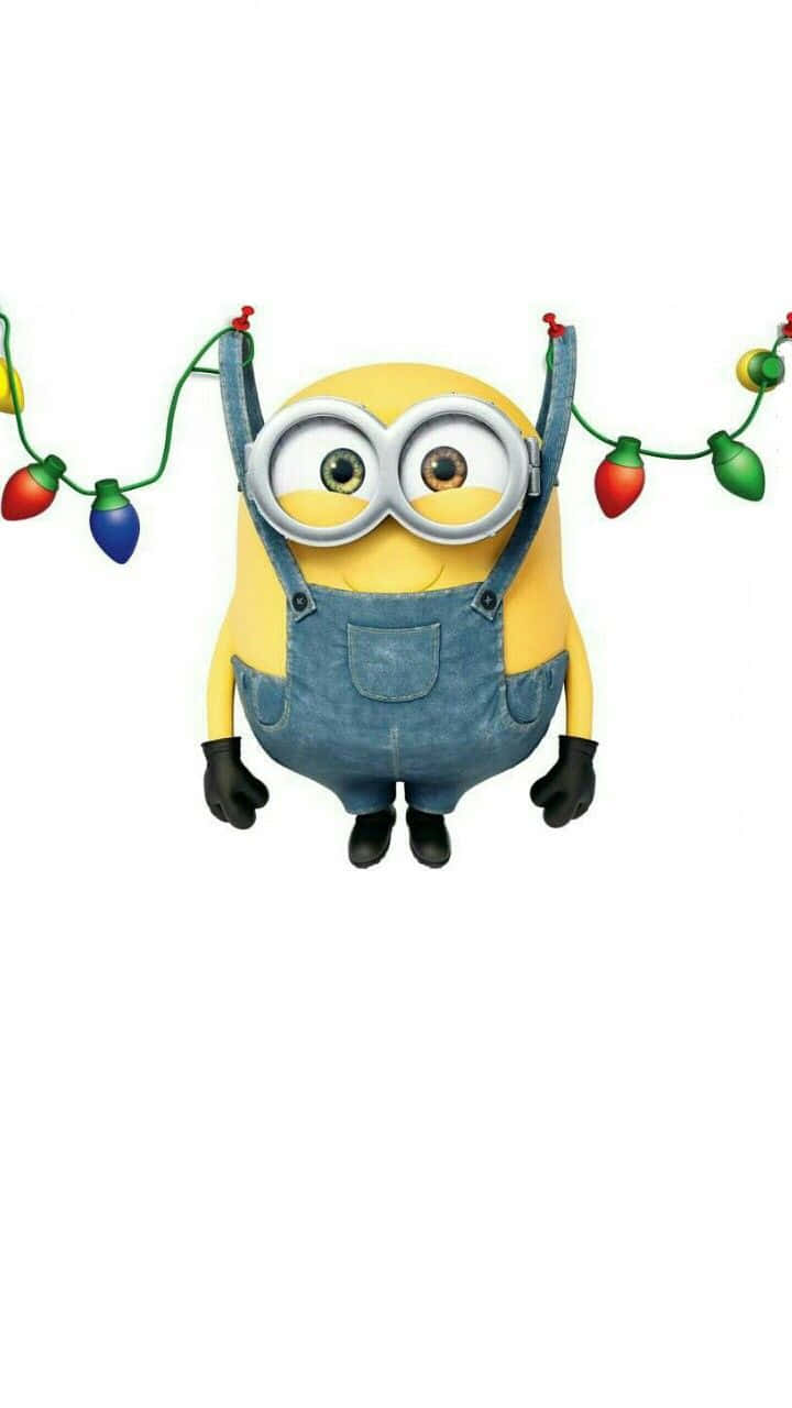 Minion Holding Christmas Lights Wallpaper