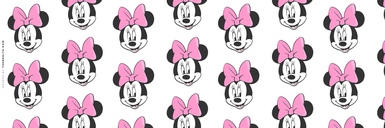 Minnie Mouse In Her Signature Pink Outfit Wallpaper