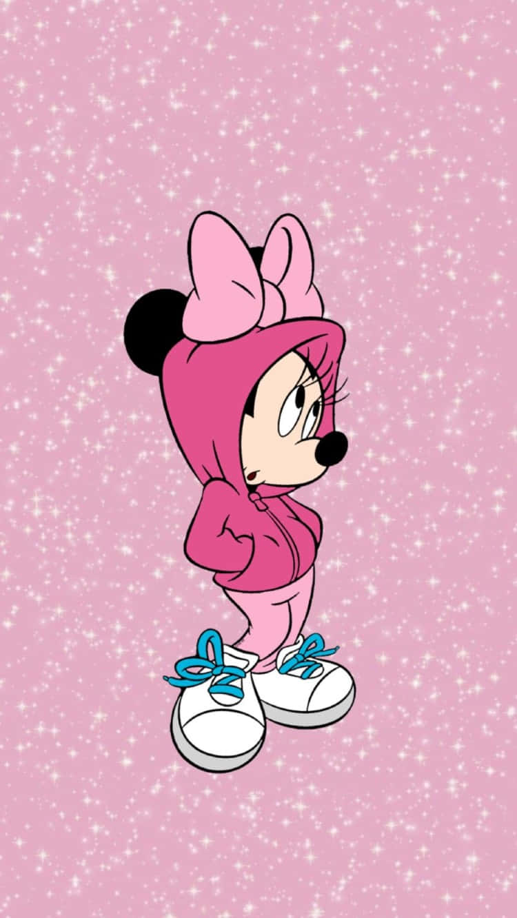 Minnie Mouse Poses In A Cute Pink Dress And Bow Wallpaper