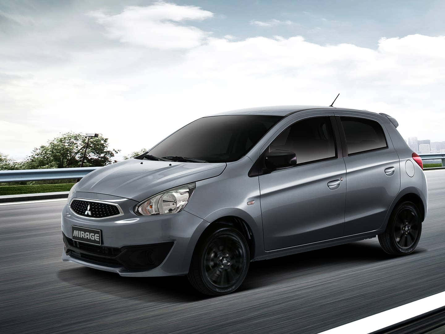 Mitsubishi Mirage On The Move Wallpaper