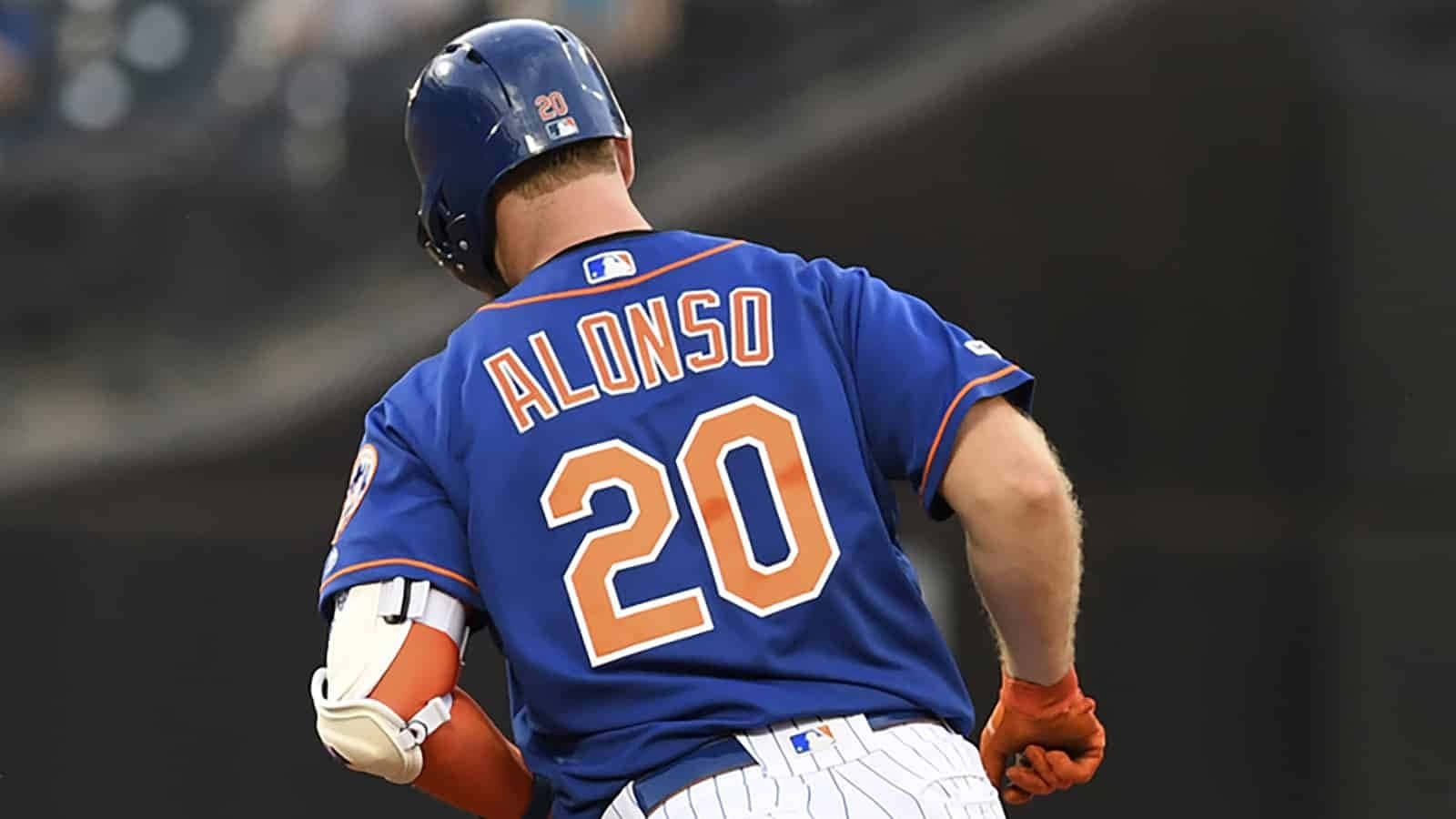 Mlb Rookie Pete Alonso Smiling After Batting Home Run Wallpaper