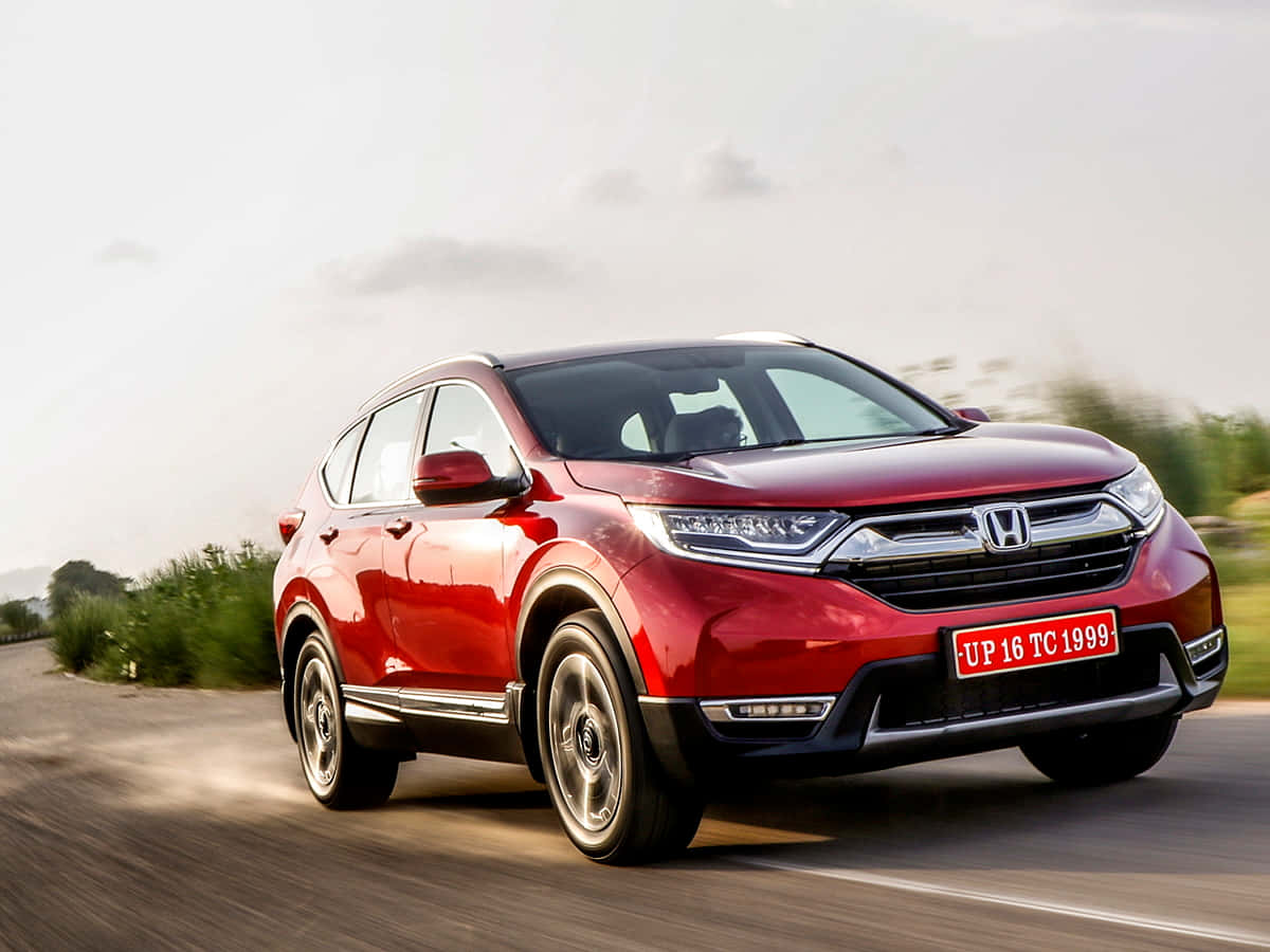 Modern Honda Cr-v In A Stunning Sunset Wallpaper