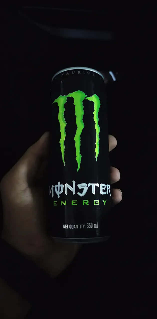 Monster Energy Drink Can Heldin Hand Wallpaper