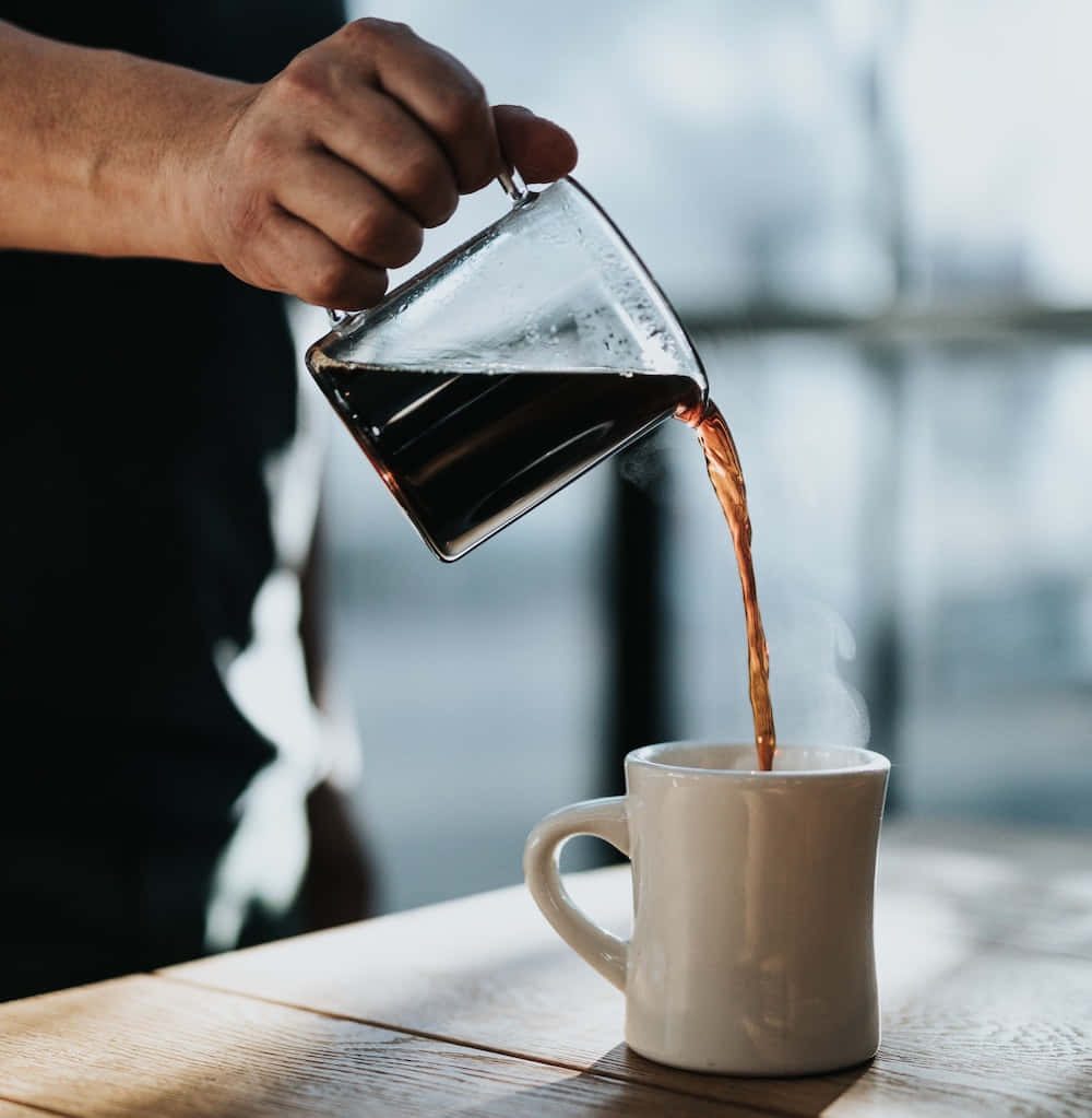 Morning Coffee Pouring Into Mug Wallpaper