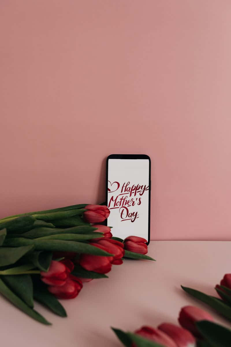 Mothers Day Tulipsand Phone Message Wallpaper