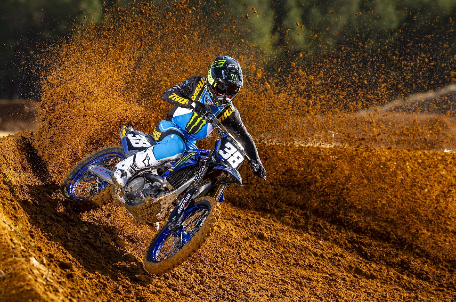 Motocross Rider Corneringin Dirt Wallpaper