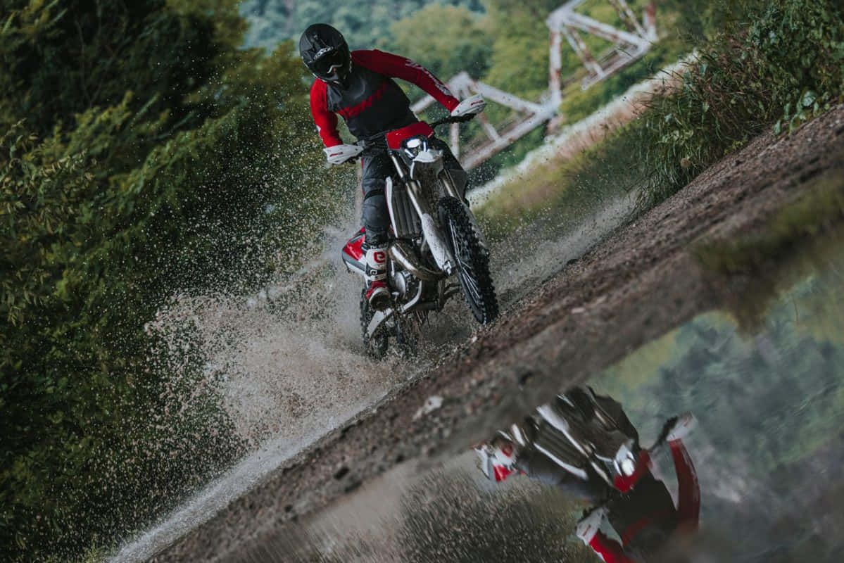 Motocross Rider Splashing Water.jpg Wallpaper