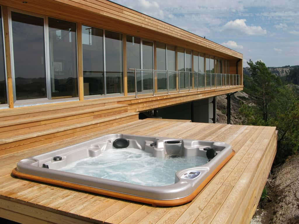 Mountain View Hot Tubon Wooden Deck Wallpaper