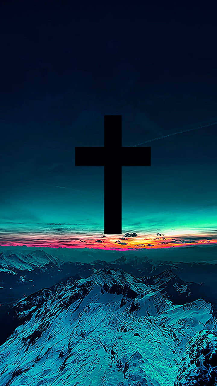 Mountainous_ Cross_at_ Sunset_ Aesthetic Wallpaper