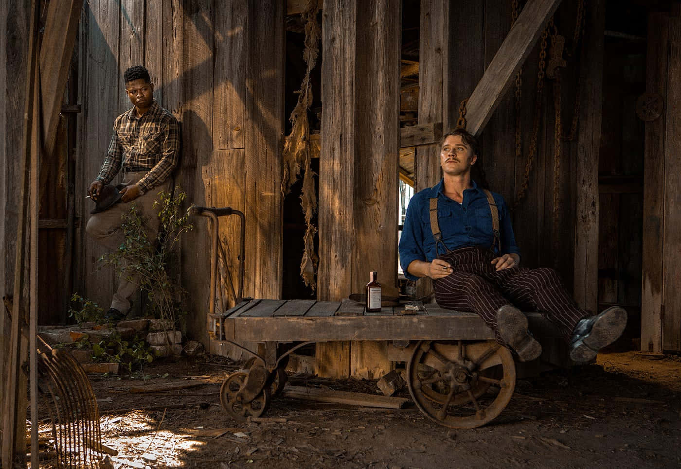 Mudbound Charactersin Barn Scene Wallpaper