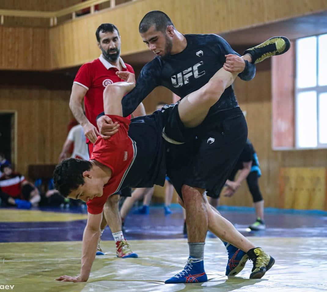 Muhammad Mokaev Teaching Holds Wallpaper