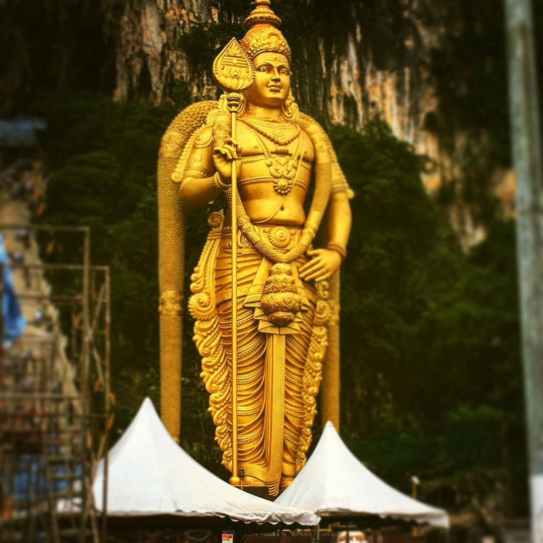 Murugan Statue With White Tents Wallpaper