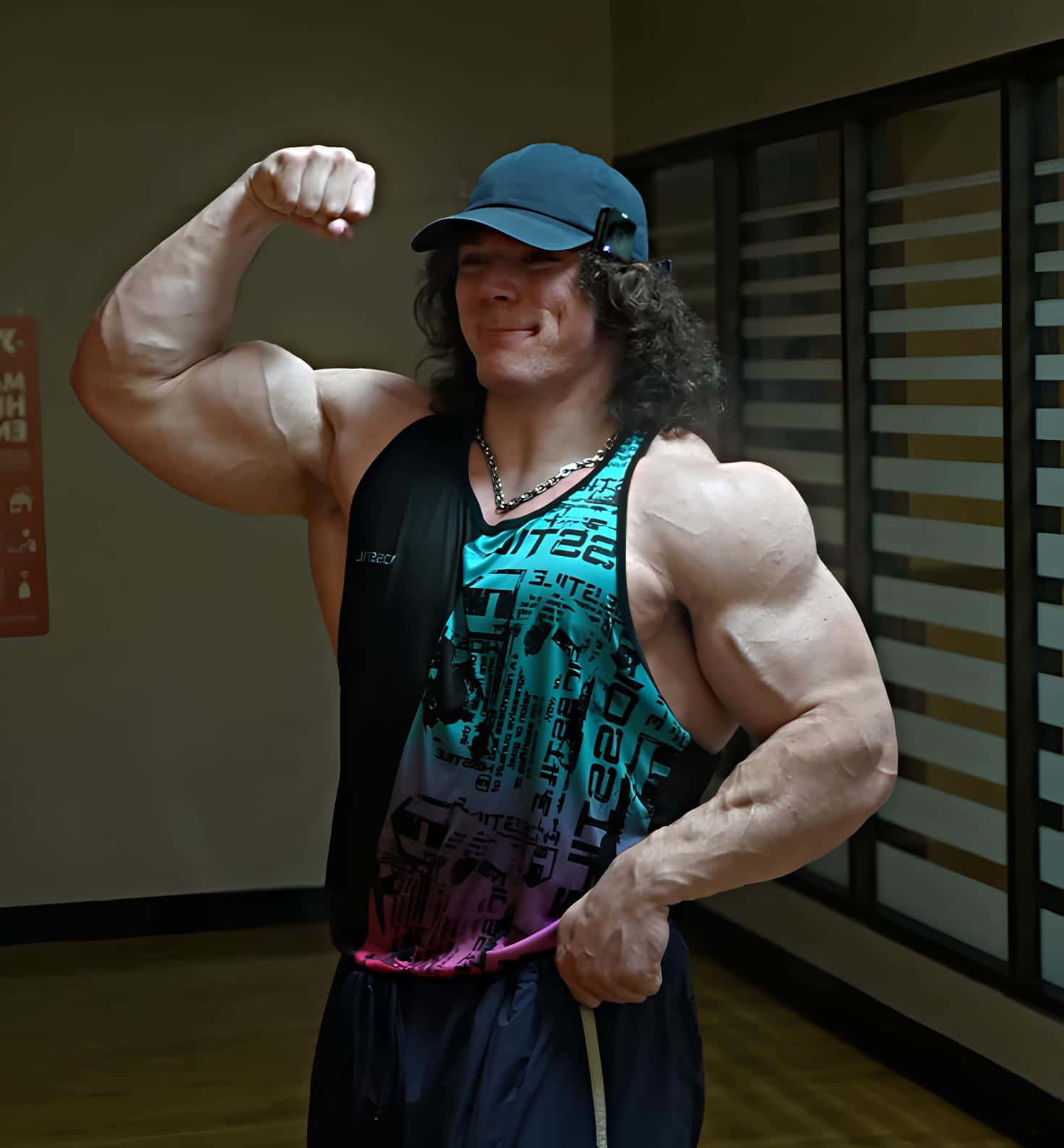 Muscular Man Flexing Bicep.jpg Wallpaper