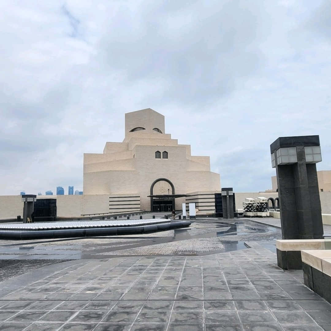 Museum Of Islamic Art Beneath Cloudy White Sky Wallpaper