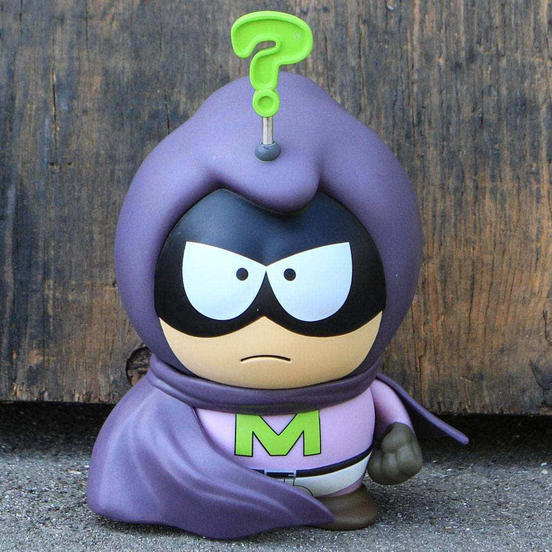 Mysterion Figure Wooden Background Wallpaper