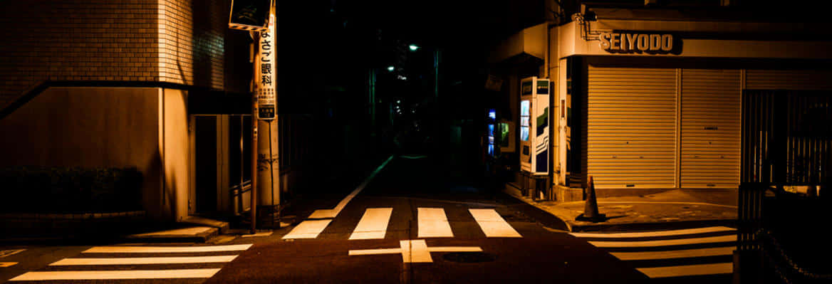 Mysterious Dark Crossroad Under Moonlight Wallpaper