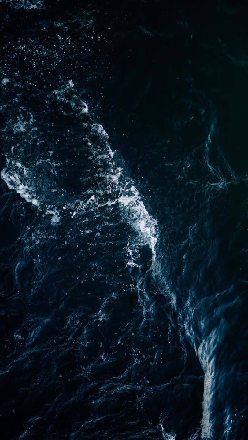 Mysterious Dark Ocean Waves Wallpaper