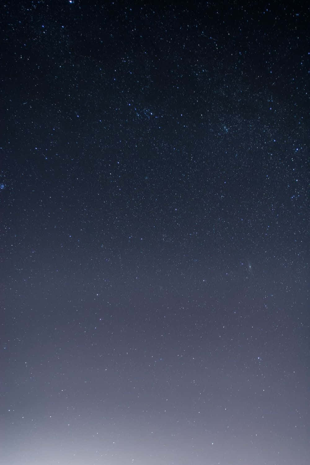 Mysterious Dark Sky Over Landscape Wallpaper