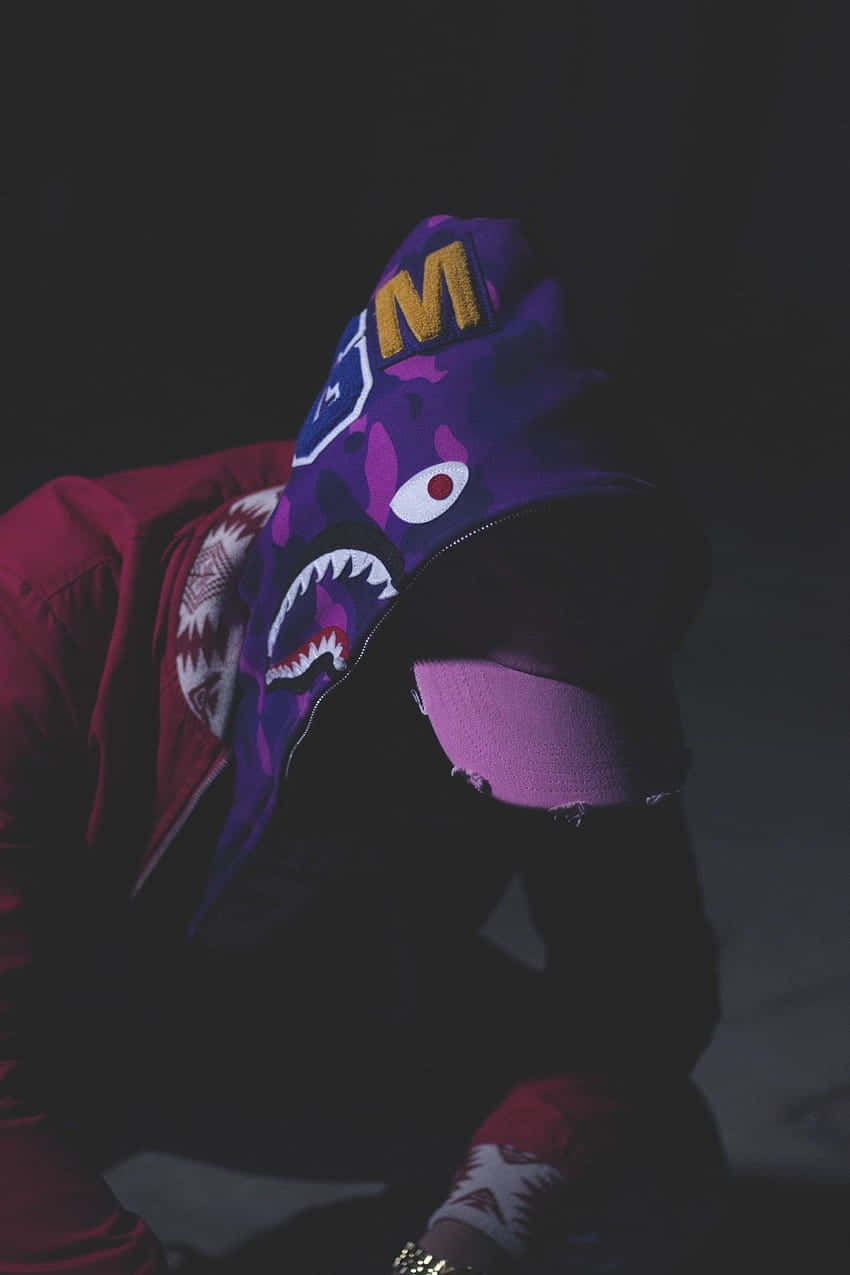 Mysterious Figurein Shark Hoodie Wallpaper