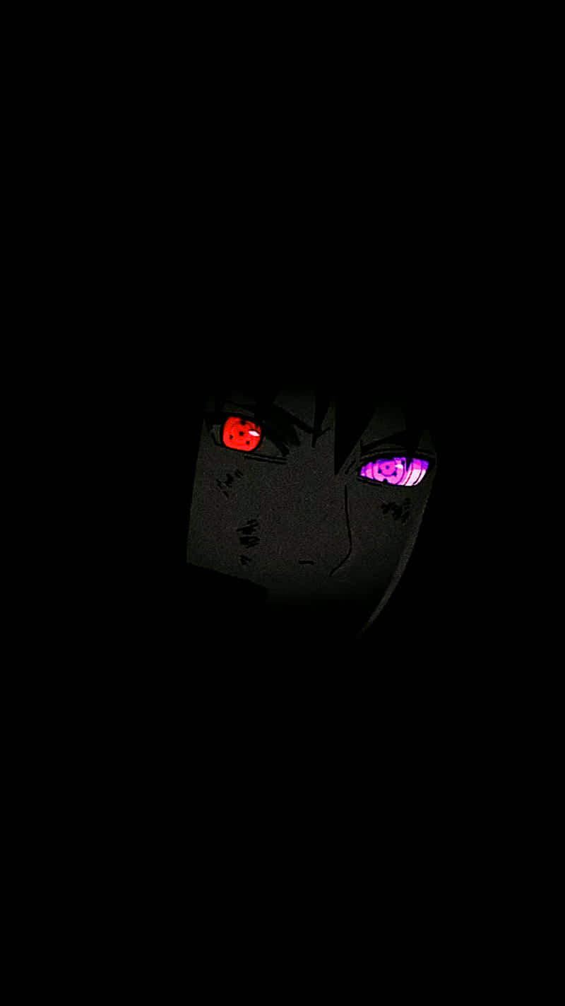 Mysterious_ Sharingan_ Eyes_in_ Darkness Wallpaper