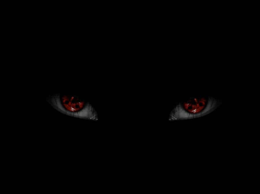 Mysterious_ Sharingan_ Eyes_in_ Darkness.jpg Wallpaper