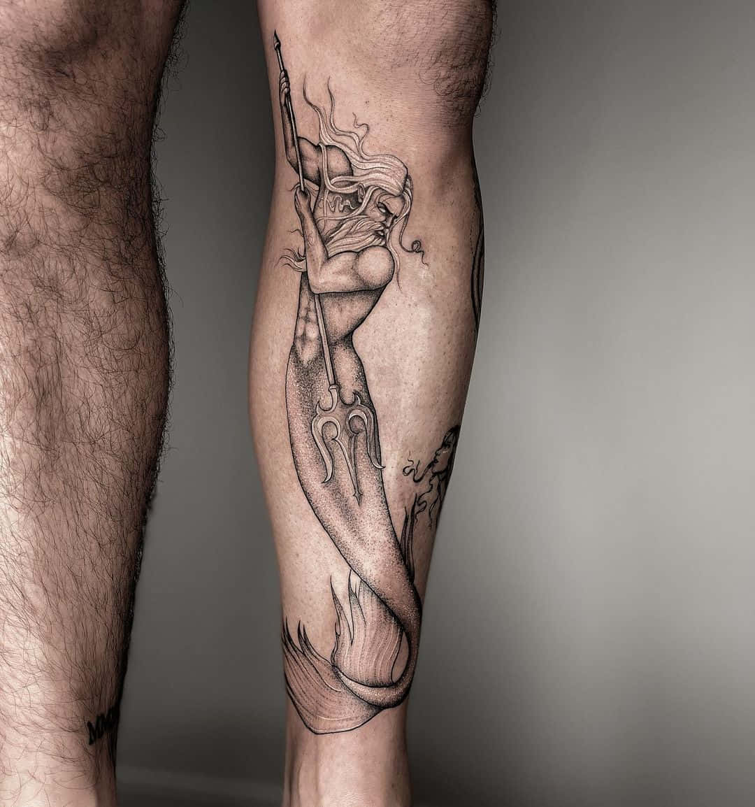 Mystical_ Figure_ Tattoo_on_ Leg Wallpaper