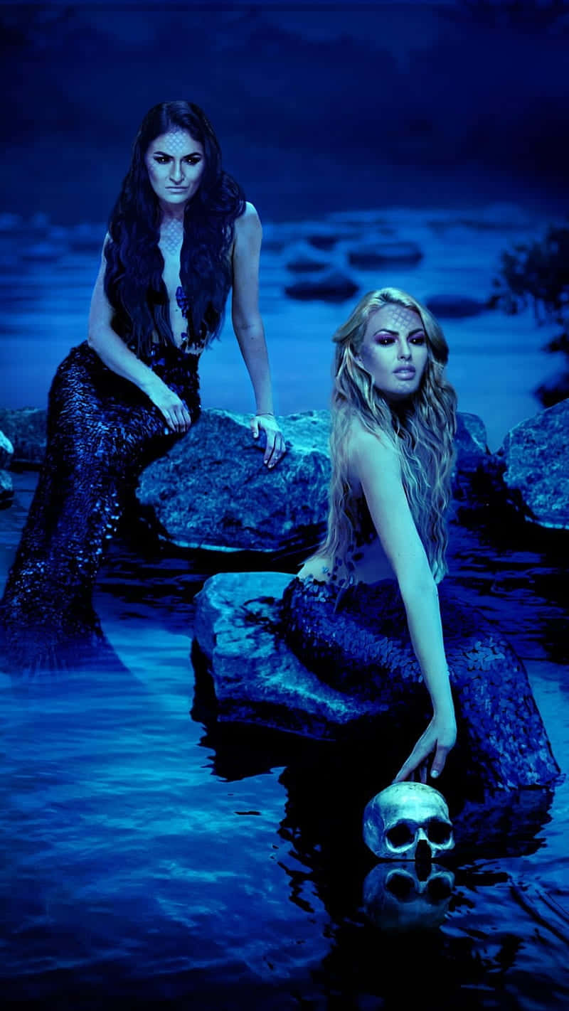 Mystical_ Mermaids_ Nighttime_ Scene Wallpaper