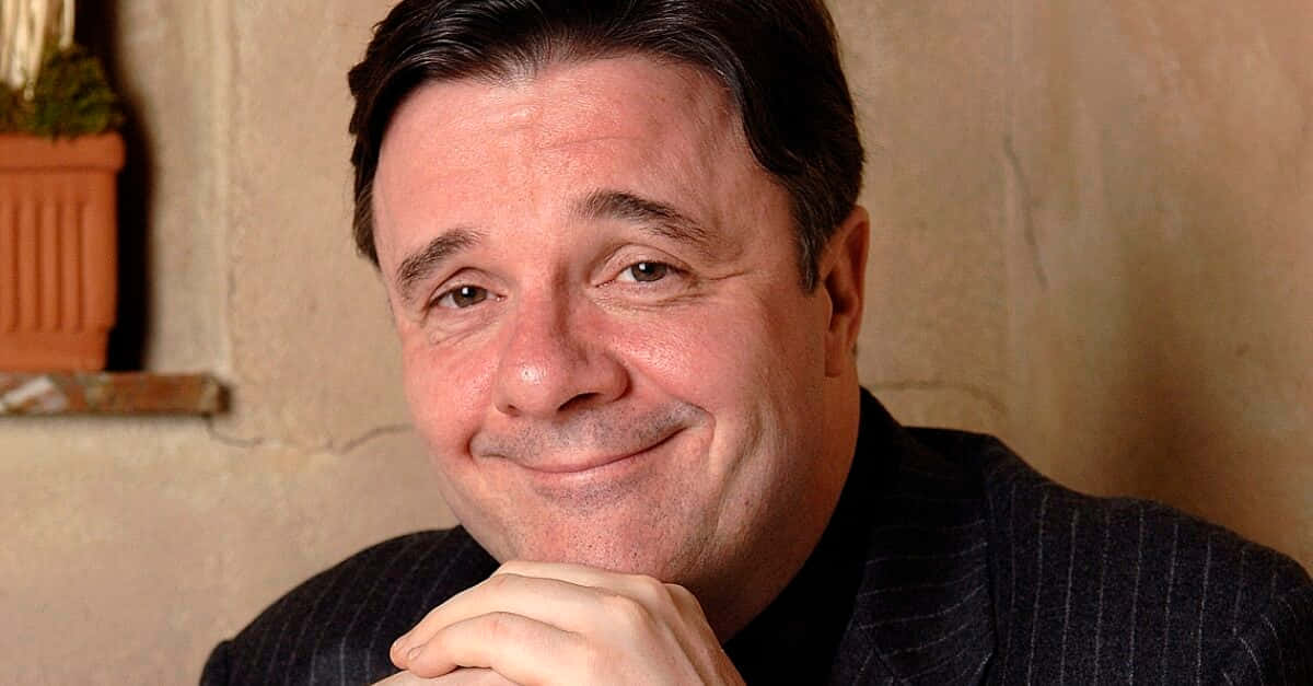 Nathan Lane: A Captivating Presence On Screen Wallpaper