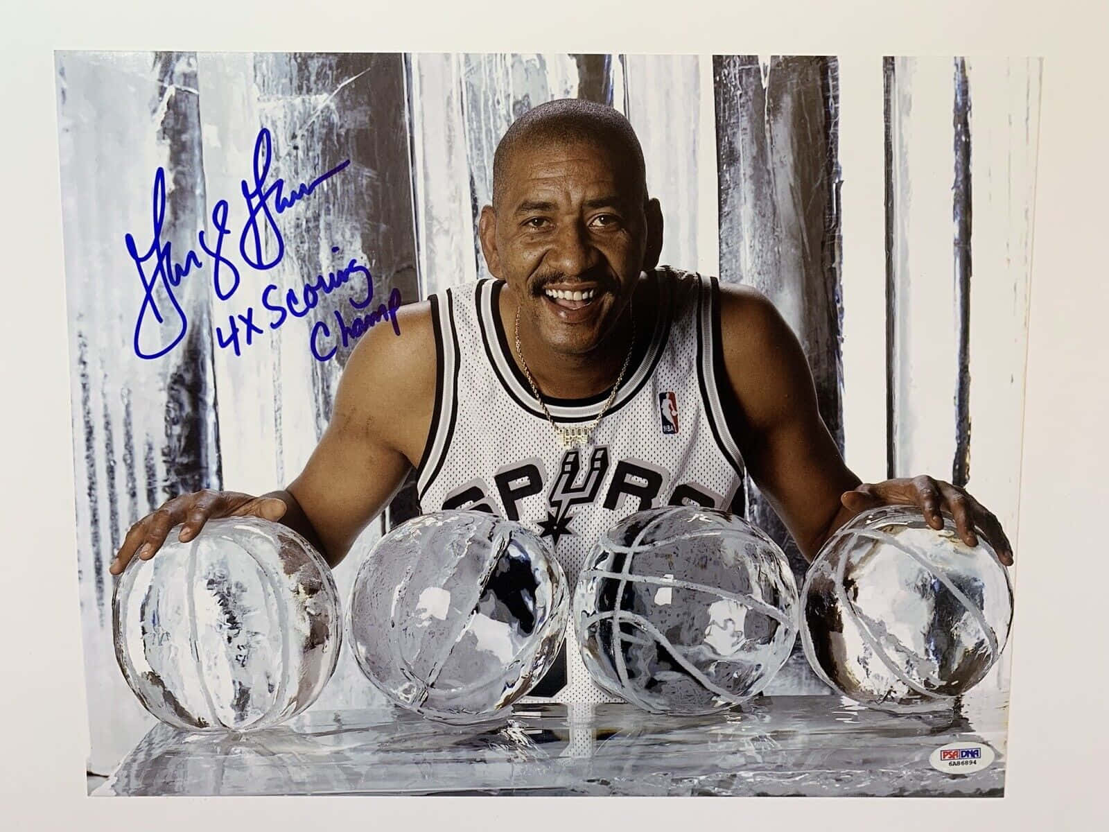 Nba Legend George Gervin’s Autographed Basketball Poster Wallpaper