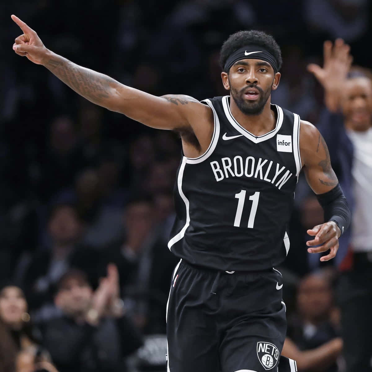 Nba Superstar Kyrie Irving Aims To Lead Nets To The Championship Wallpaper