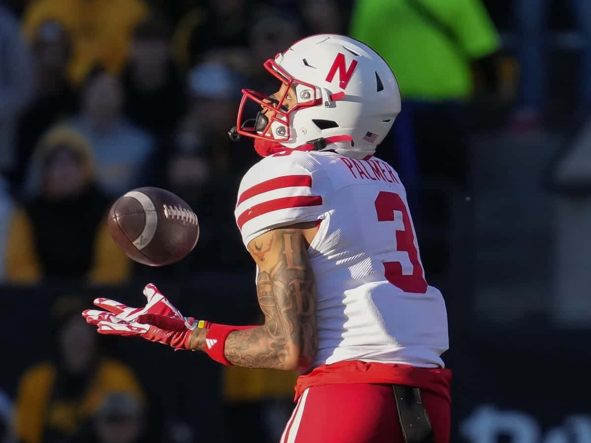 Nebraska Football Player Catching Ball Wallpaper