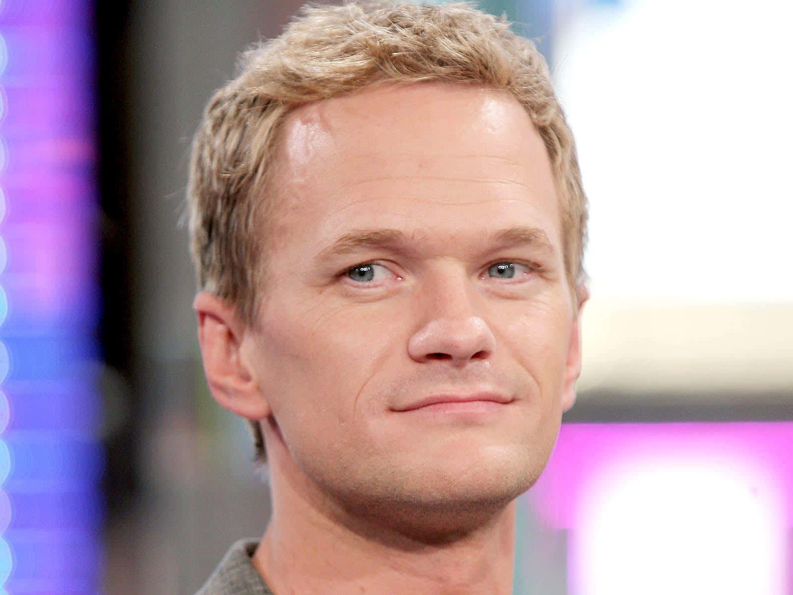 Neil Patrick Harris Glowing In Charm Wallpaper