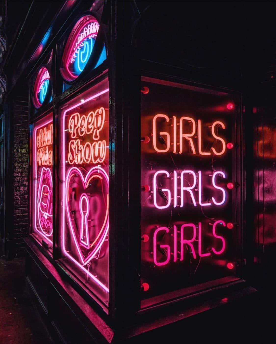 Neon Lit Adult Entertainment Signage Wallpaper