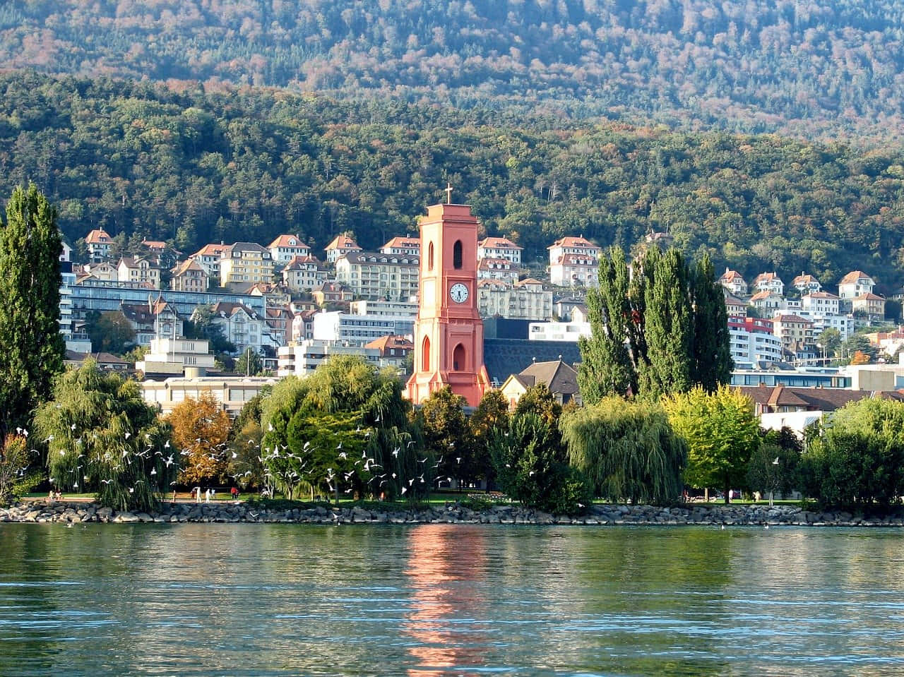 Neuchatel Lakeside Viewwith Clock Tower Wallpaper