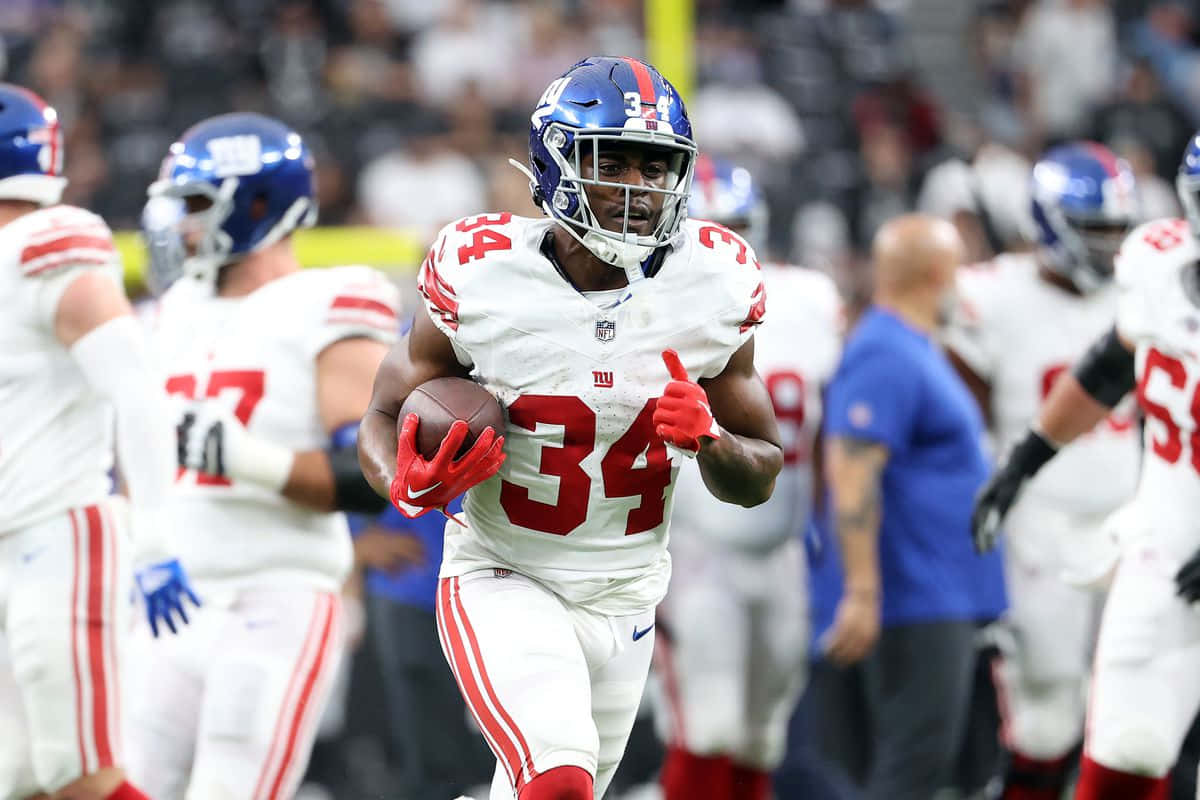 New York Giants Running Back34 Action Shot Wallpaper