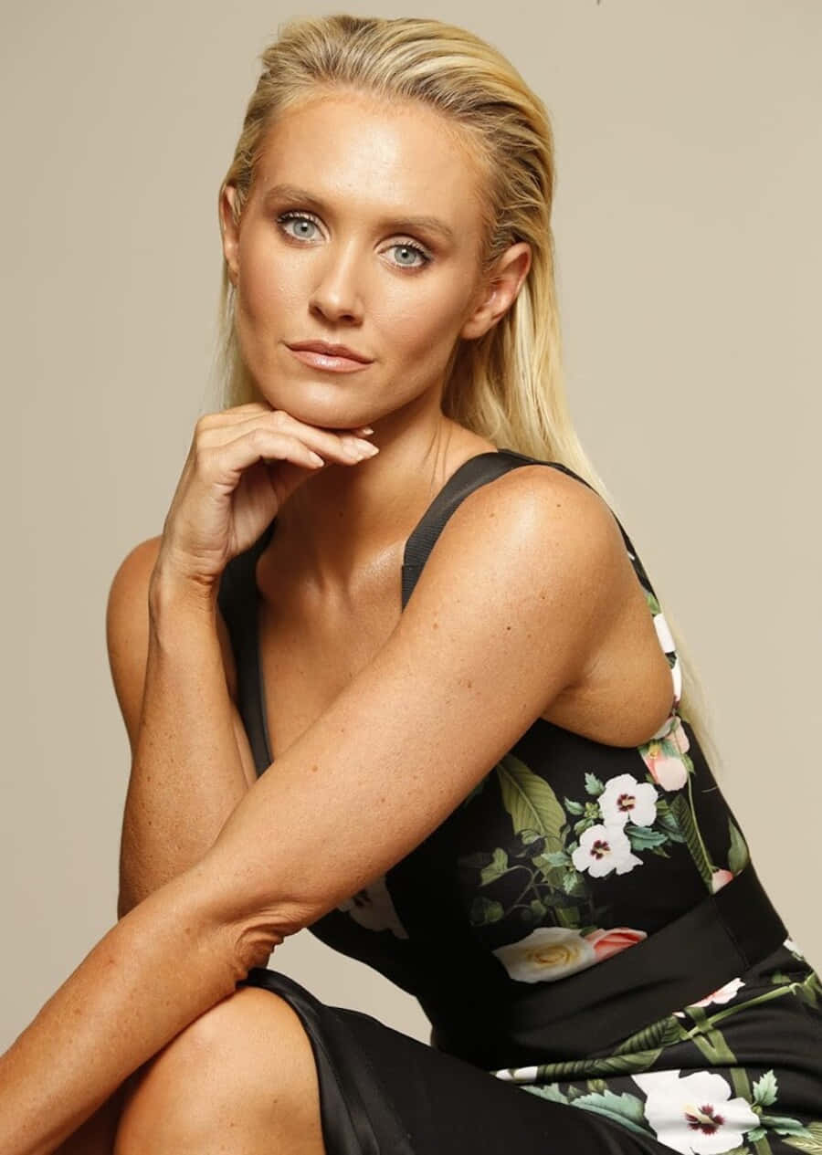 Nicky Whelan Posing Elegantly In A Photo Shoot Wallpaper