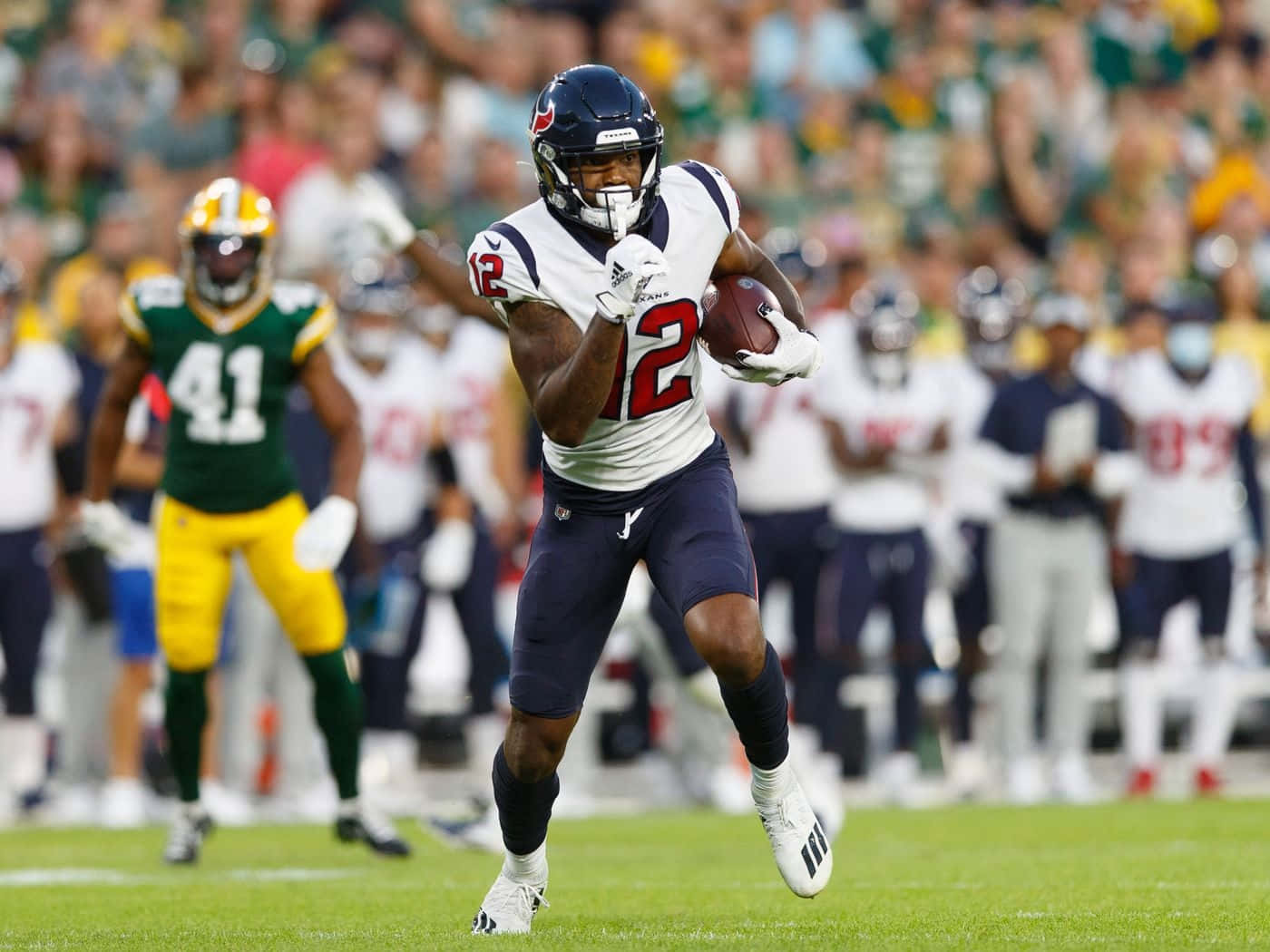 Nico Collins Houston Texans Game Action Wallpaper