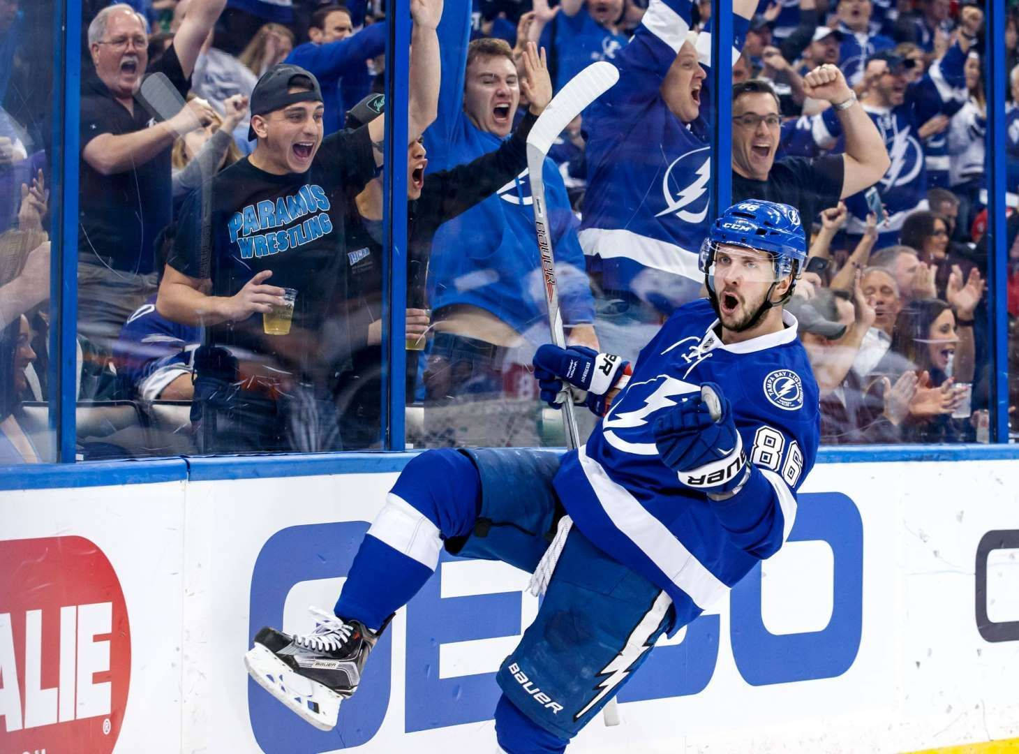 Nikita Kucherov Jubilantly Celebrating Victory On The Ice Wallpaper