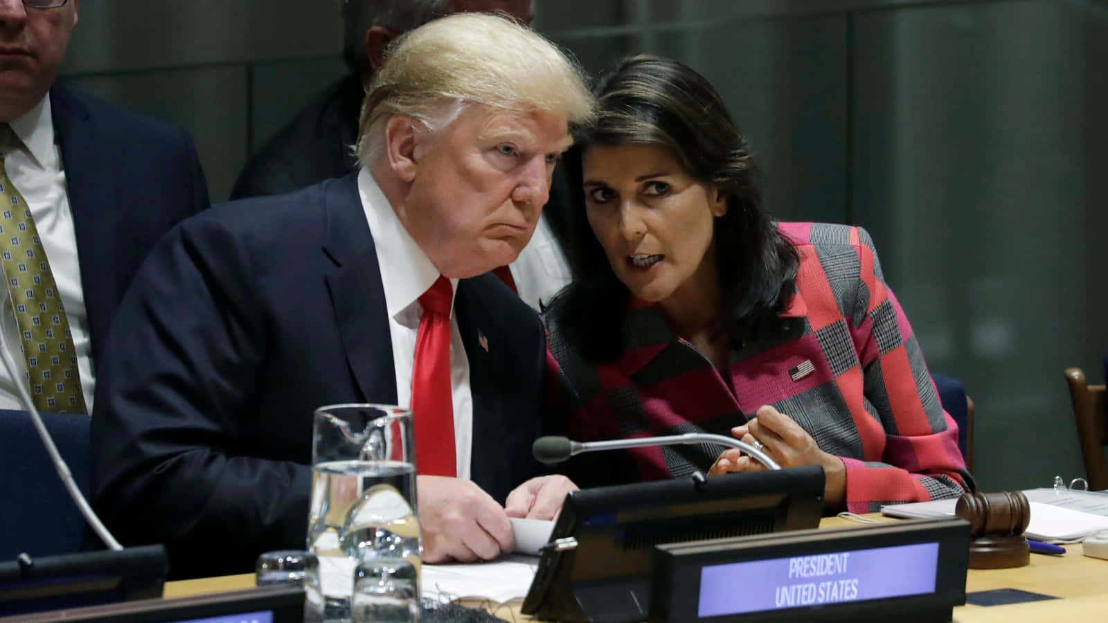 Nikki Haley And Donald Trump At A Formal Event Wallpaper