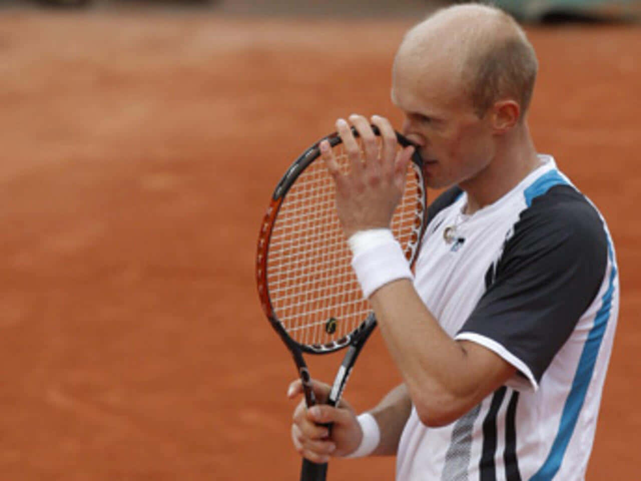 Nikolay Davydenko Pondering Tactics On The Tennis Court Wallpaper